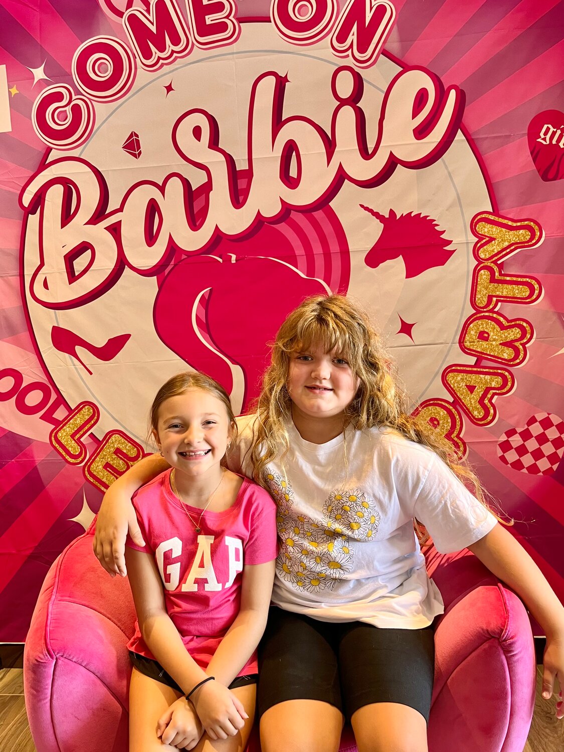 While it's not a children's movie per se, eight-year-old Ava, left, and seven-year-old pal Molly undoubtedly got the message and thought "Barbie" was "really great."